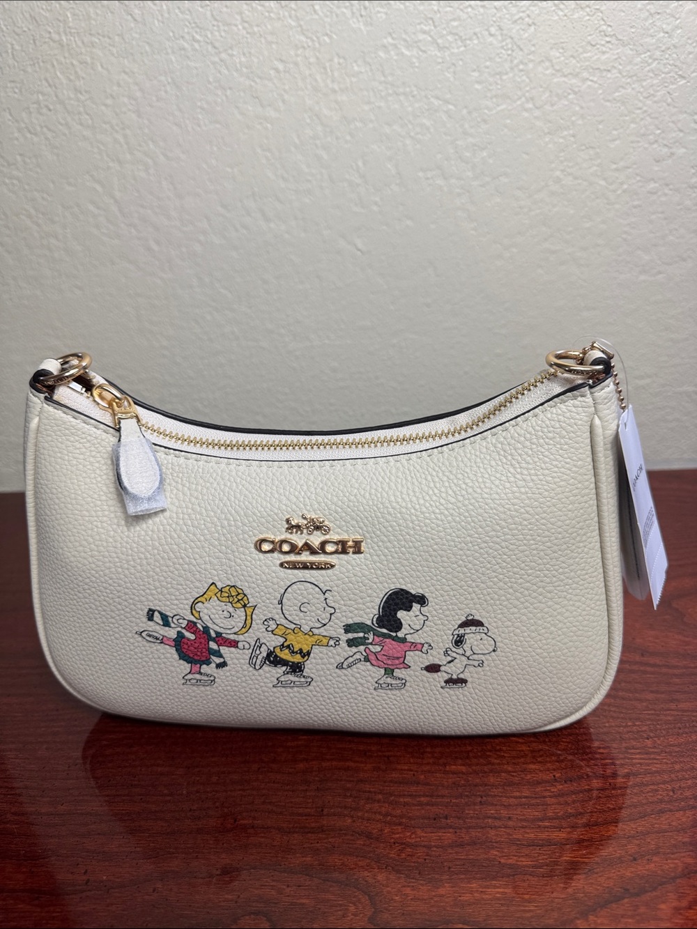 Coach X Peanuts Teri With Snoopy And Friends Motifs Cream Mini Bag.